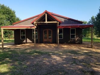 Rhino Pole - Barndominium brown with red roofing